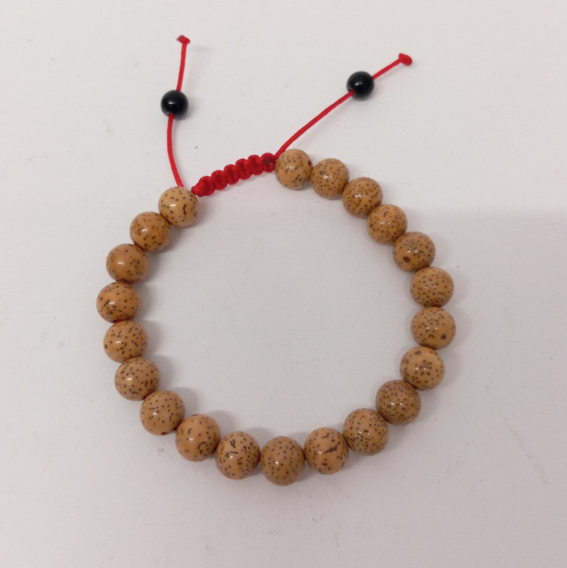 Pulsera de semillas de loto ajustable – estilo budista