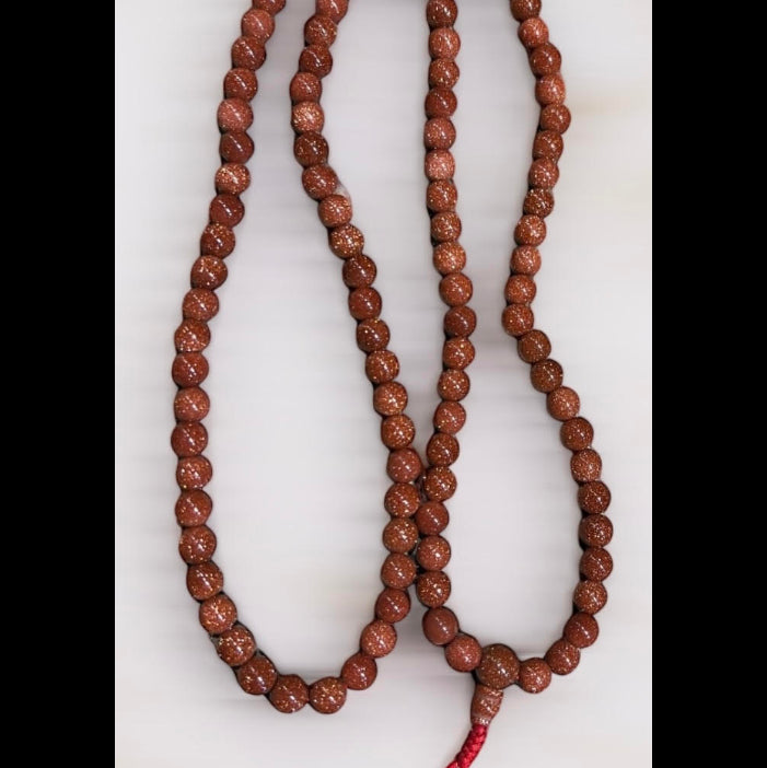 Mala Japamala de Goldstone  ( aventurina oro naranja)– 108 Cuentas – Energía y Vitalidad