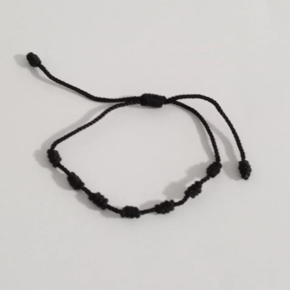 Pulsera 7 Nudos Negra – Protección y Absorción de Energías